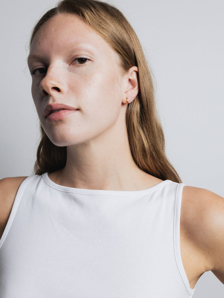 Organic Huggie Hoops (Gold) by Wolf Circus