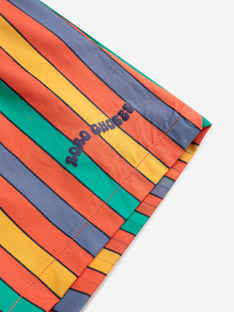 Multicolor Stripes Swim Board Shorts (Kids) by Bobo Choses